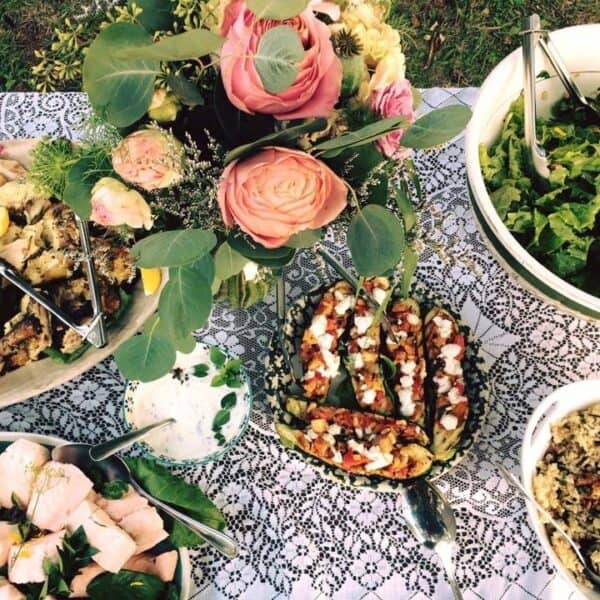 Set table with buffet and a rose bouquet